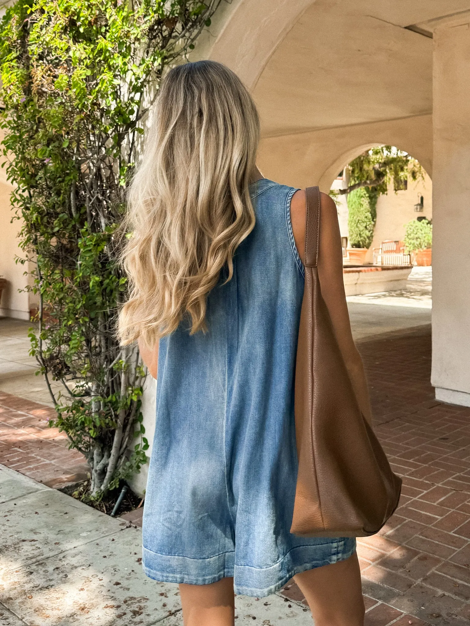 Henley Pleated Denim Romper in Dark Wash