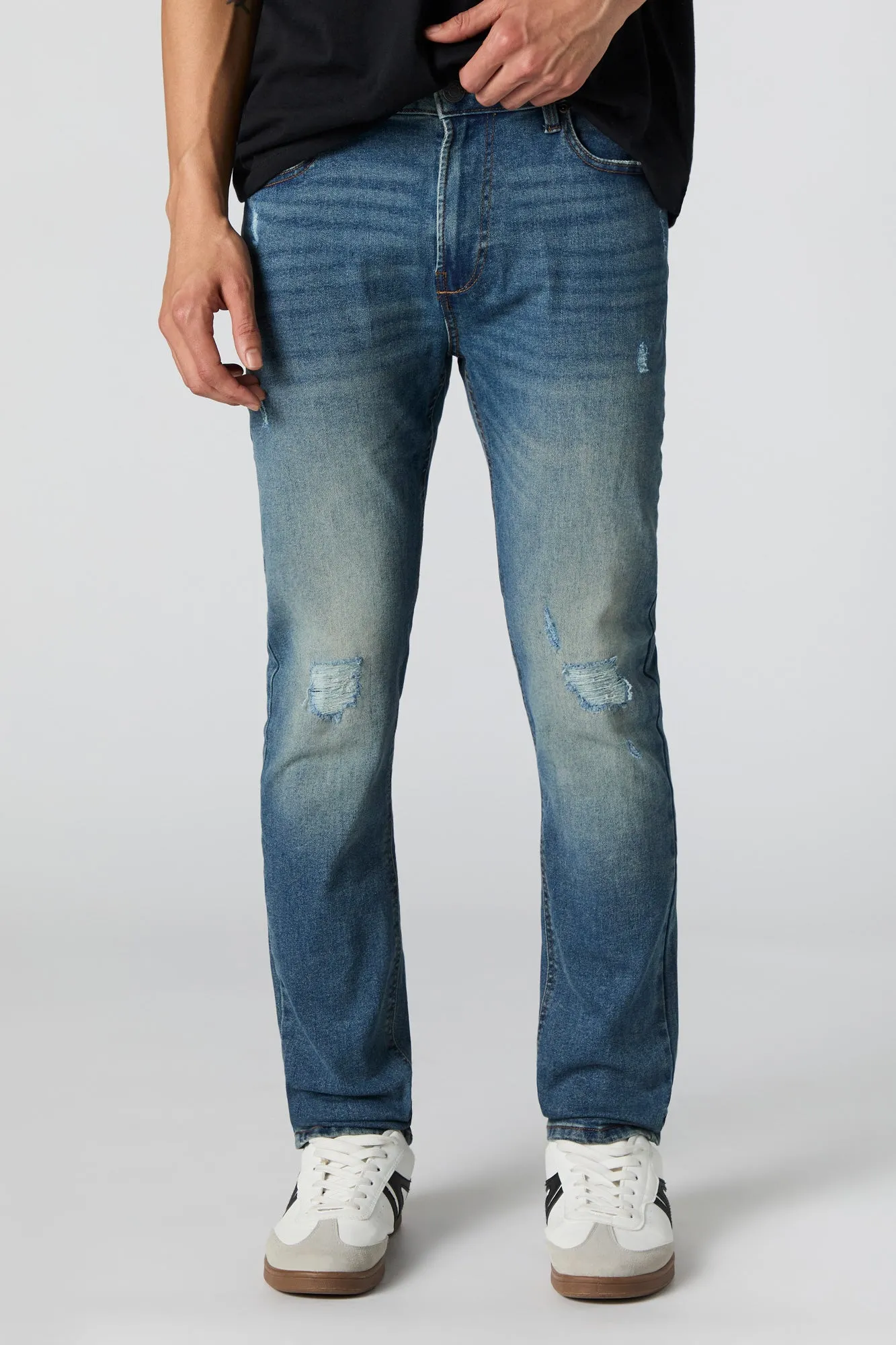 Jean mince extensible à effet d'usure lavé foncé