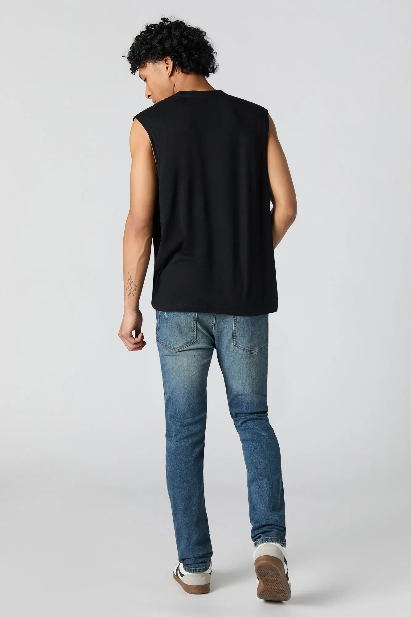 Jean mince extensible à effet d'usure lavé foncé
