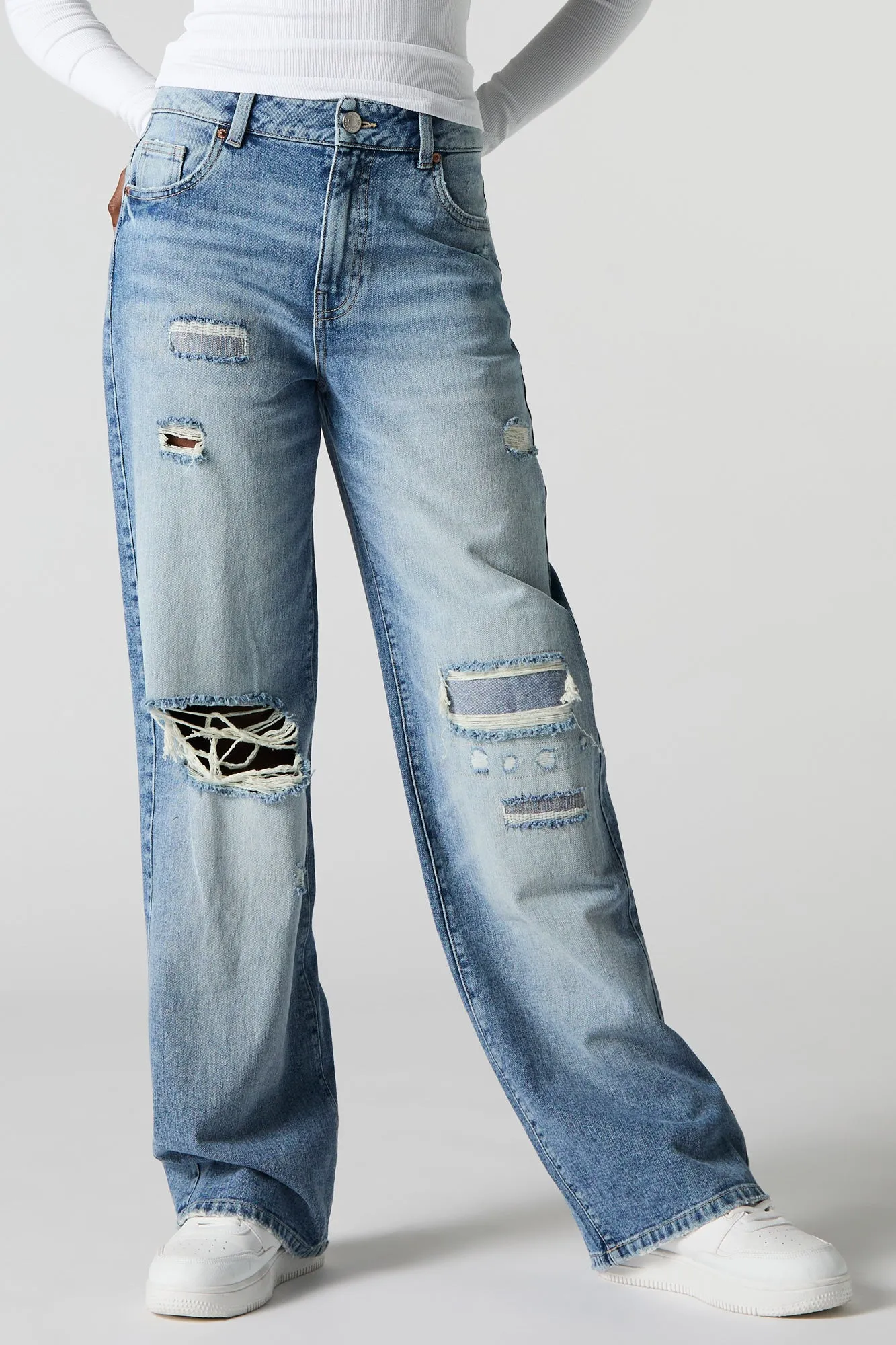 Jean taille haute à jambe large d'aspect usé