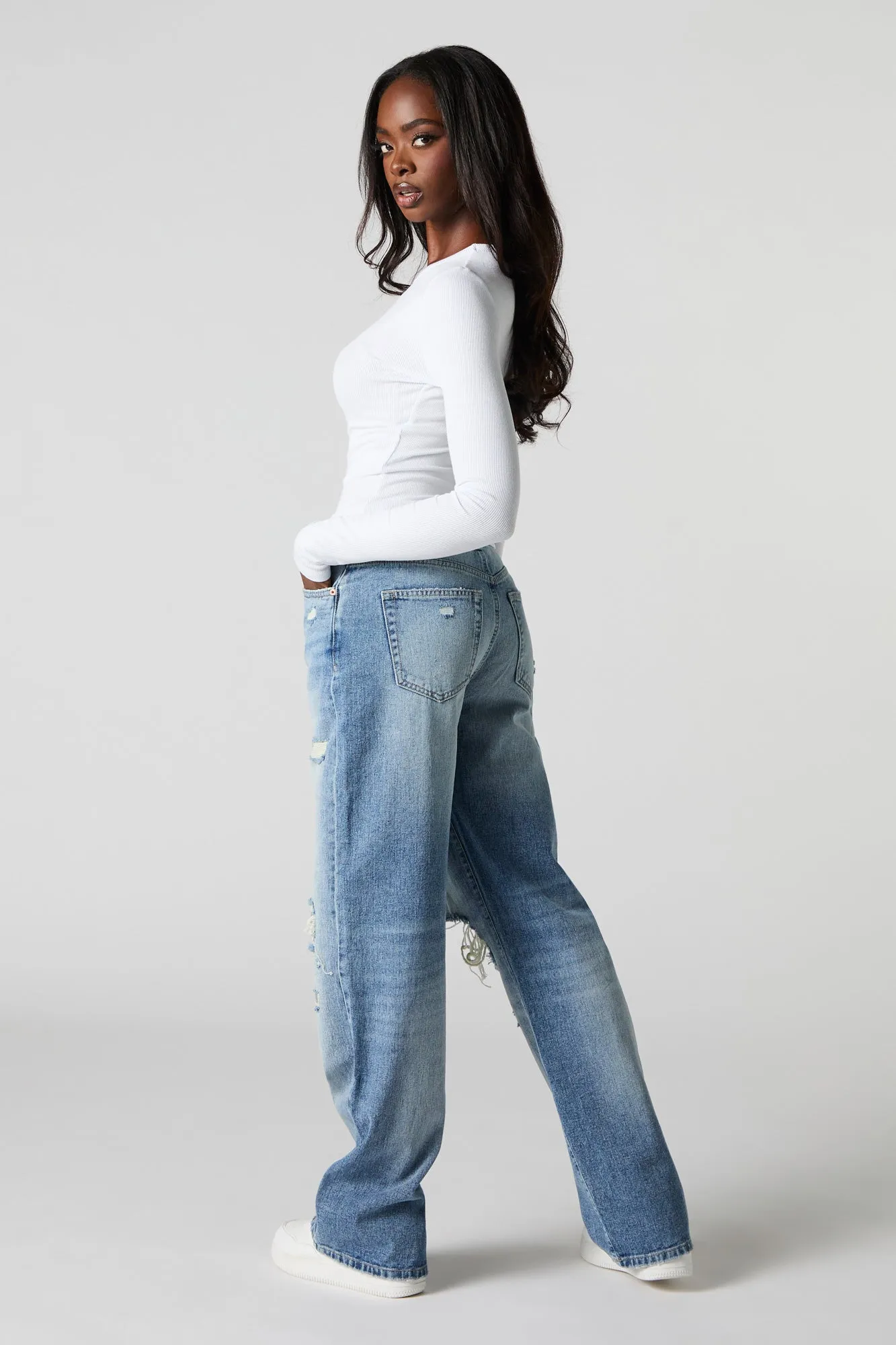 Jean taille haute à jambe large d'aspect usé