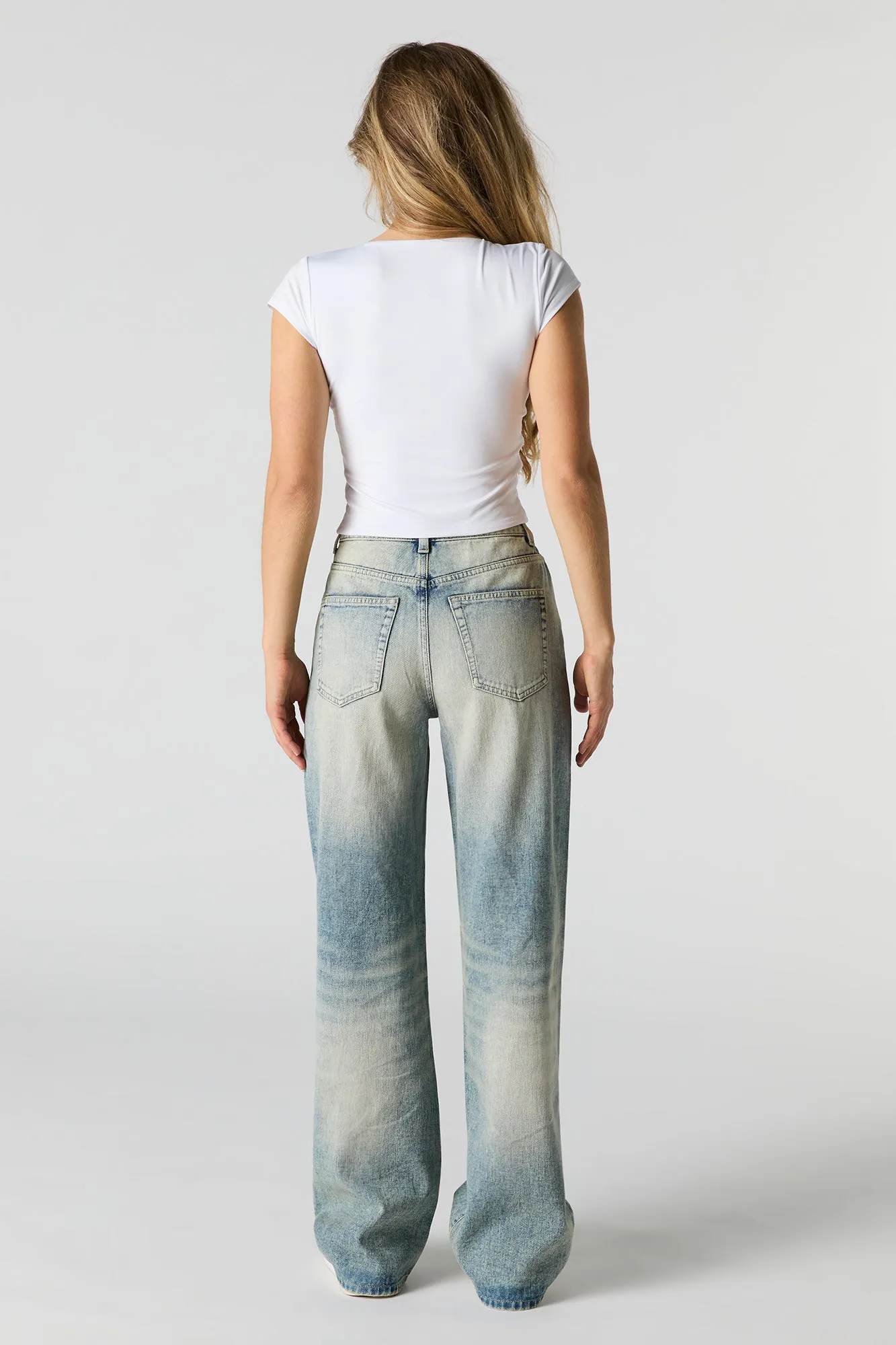 Jean taille haute à jambe large délavé pâle vintage