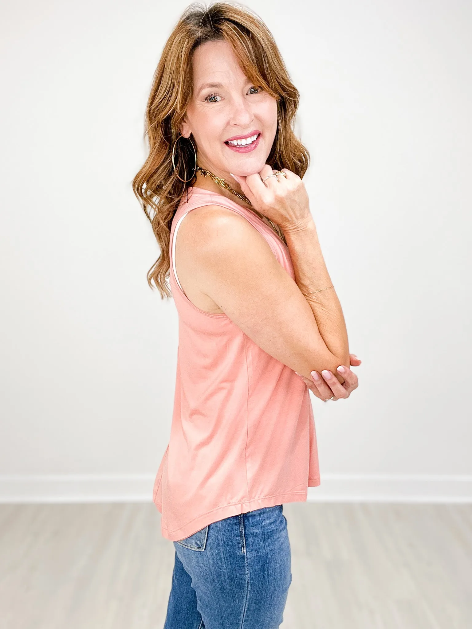 Sleeveless V-Neck Top with Rounded Hemline