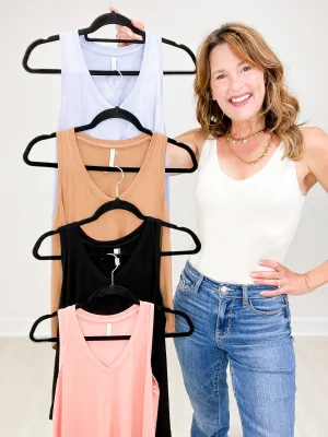 Sleeveless V-Neck Top with Rounded Hemline